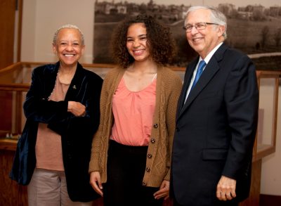 Michelle Wright (center), who won third place in the 2015 Steger Poetry contest, is pictured with Nikki Giovanni and Charles Steger.