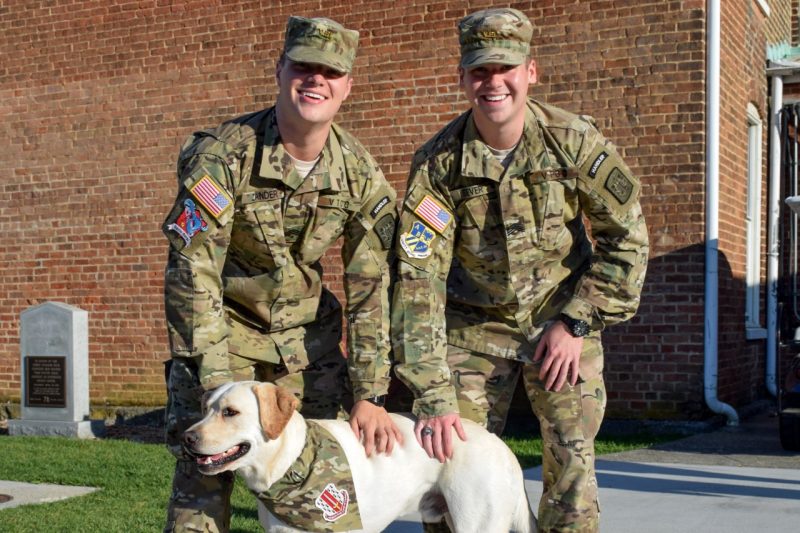 Cadets Jeffrey Zander, at left, and Zack Sever with Growley II.