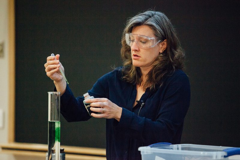 Maggie Bump performs a chemistry demonstration