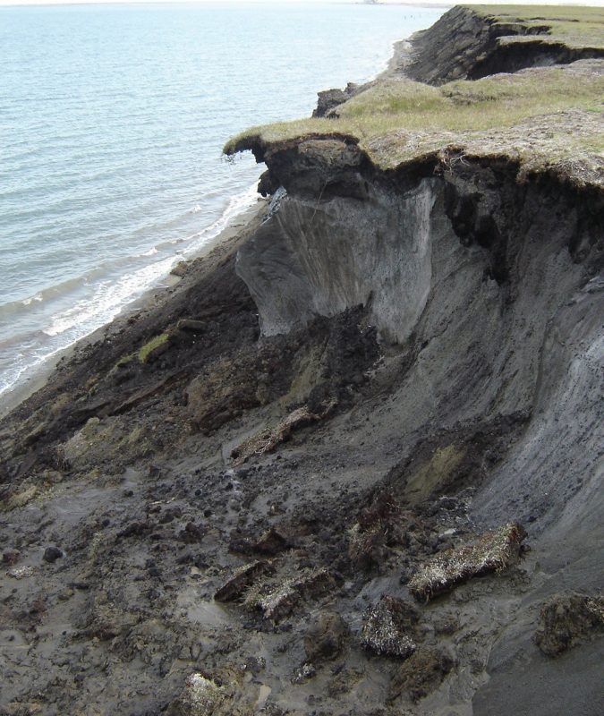 Cliff with permafrost on beach