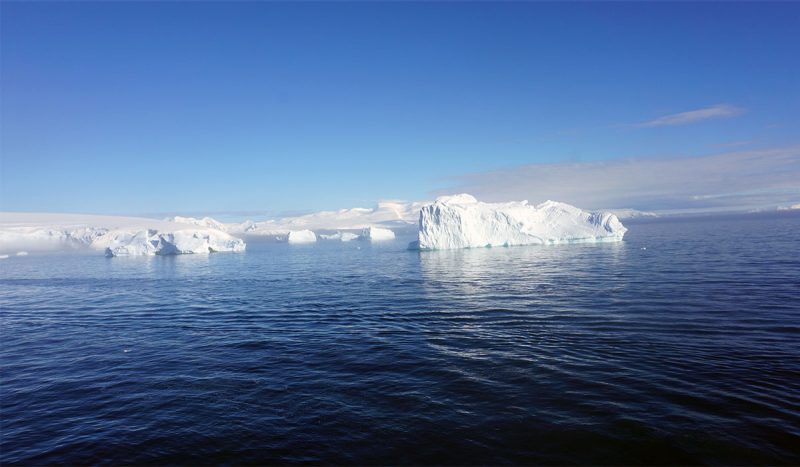 Image of iceberg surrounded by water in Antarctica