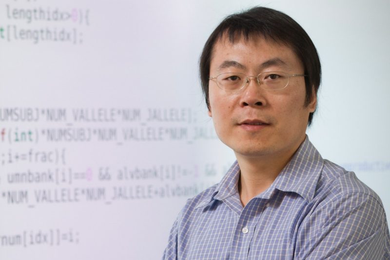 Guoqiang Yu, an assistant professor in the Bradley Department of Electrical and Computer Engineering.