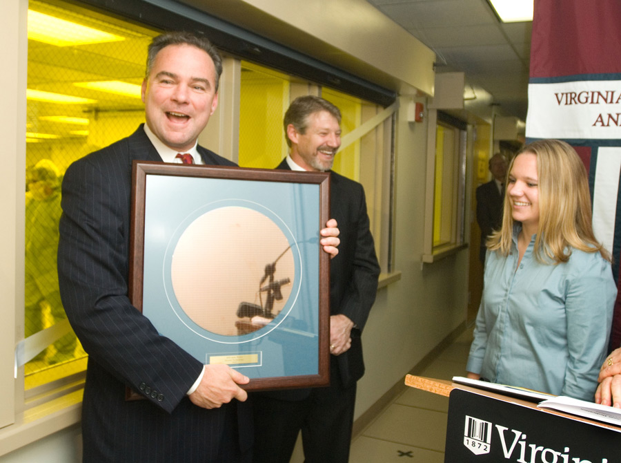 Governor receives framed wafer from Julie Cushen