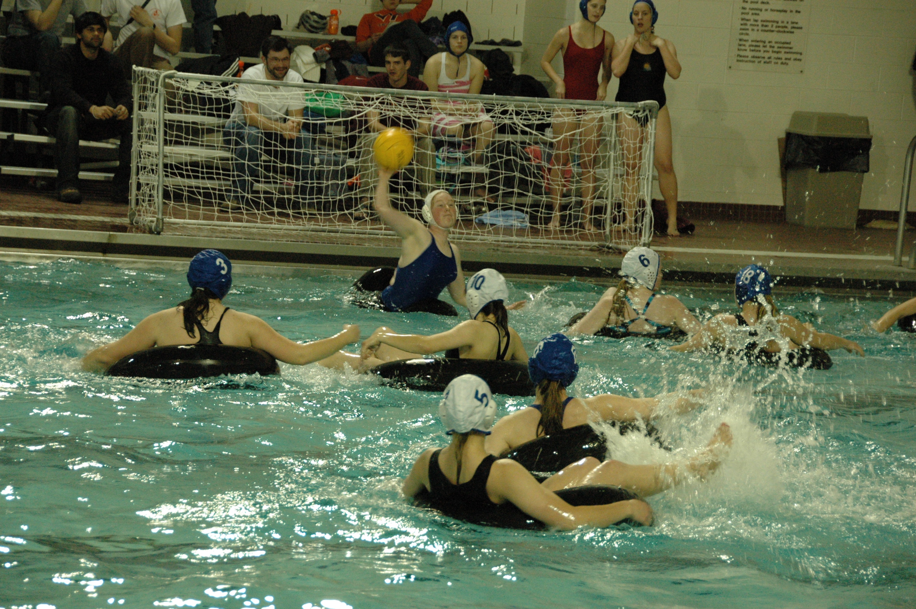 Students play innertube water polo