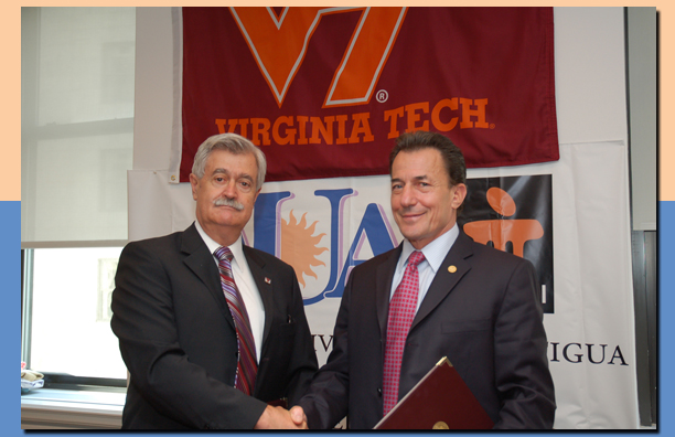 Dr. Gerhardt Schurig (left), dean of the Virginia-Maryland Regional College of Veterinary Medicine, and Neal Simon (right), president and co-founder of the American University of Antigua.