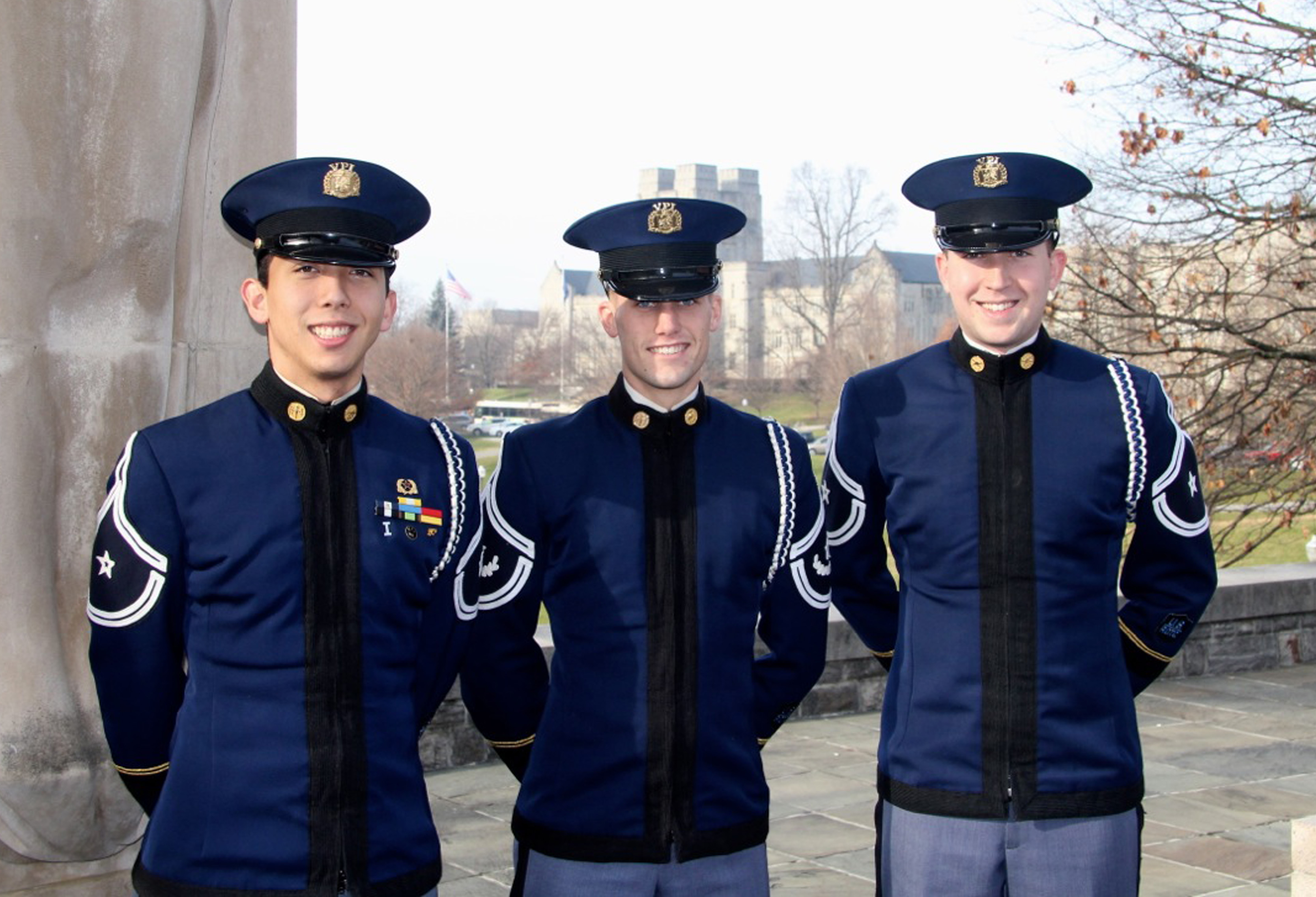 From left to right are Cadets Dustin Caranci, Austin Burns, and Brett Cowell standing at the Pylons