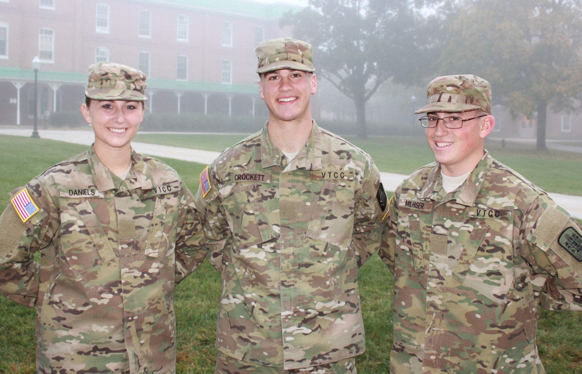 From left to right are Cadets Rachel Daniels, John Crockett, and Gregory Milhiser standing on the Upper Quad.
