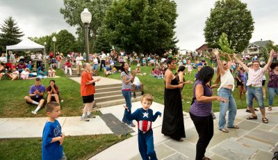 Concert goers enjoy live music at the free Friday night concerts on Henderson Lawn.