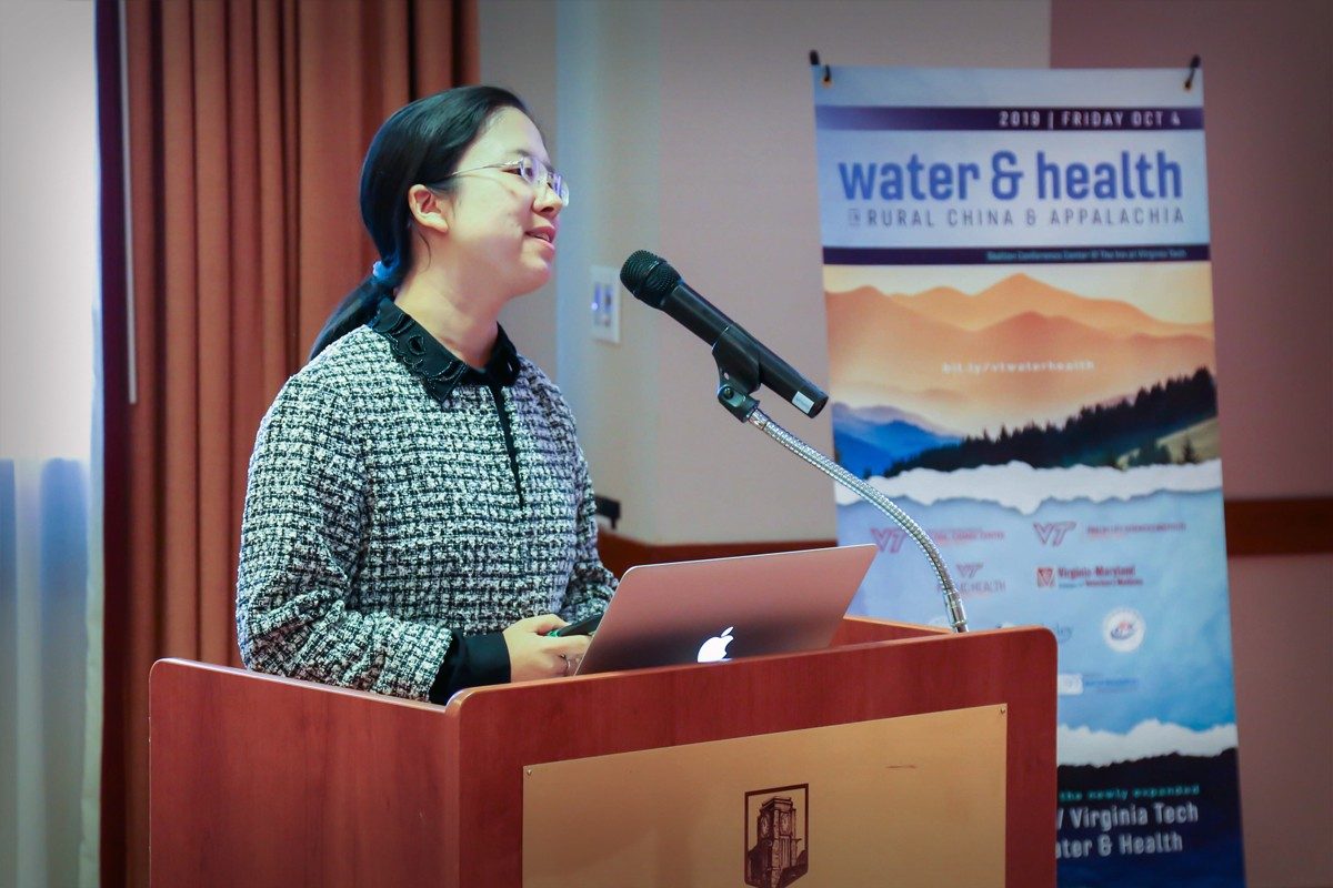 Luo Qing presenting at the Water&Health Conference