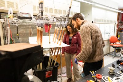 Amy Prudent works with a student in her lab.