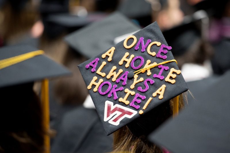 A  mortarboard decorated with the phrase "Once a Hokie always a Hokie."