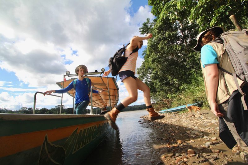Emily Burke jumps off a boat to visit a village that is only accessible via the Napo River. 