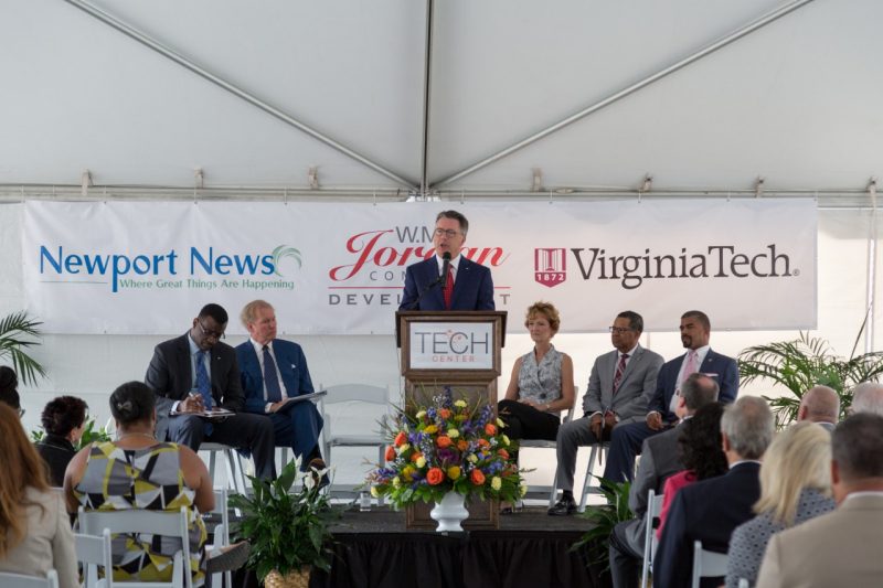 President Tim Sands speaks in front of a crowd at the groundbreaking ceremony of Building One @ Tech Center.