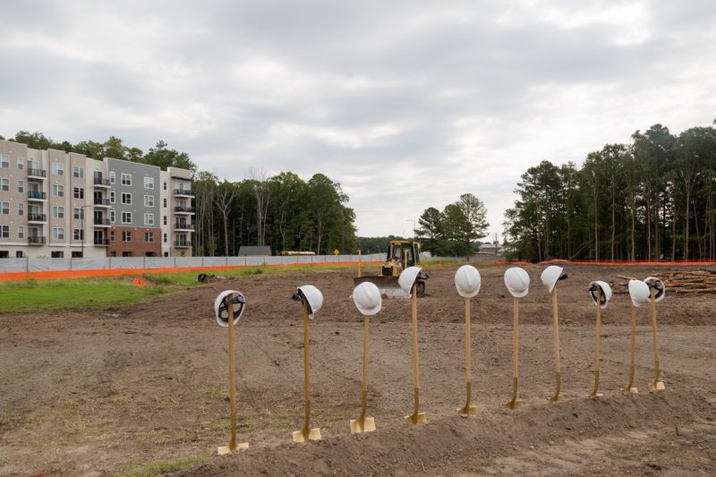 Ten shovels were placed in the dirt ahead of a groundbreaking ceremony to mark construction for Building One @ Tech Center.