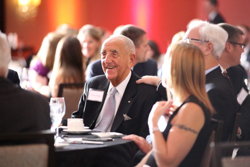 Howard Feiertag at a table with other guests at a gala in his honor last November.