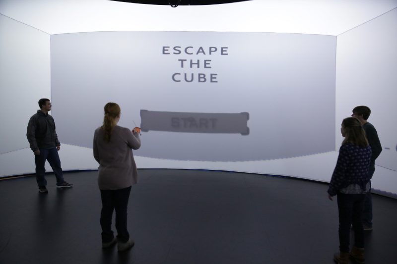 Students challenge themselves to get through the various rooms as quickly as they can in the Escape the Cube puzzle game.