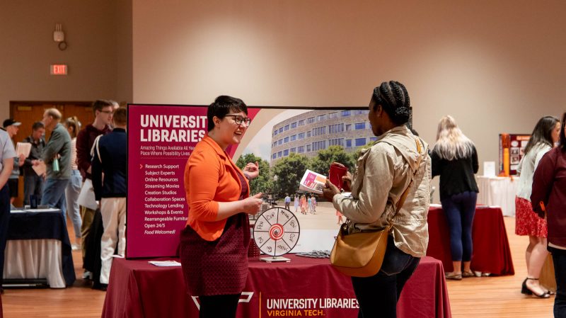 Students learn about all the resources on campus, including University Libraries, at the Hokie Focus information fair.