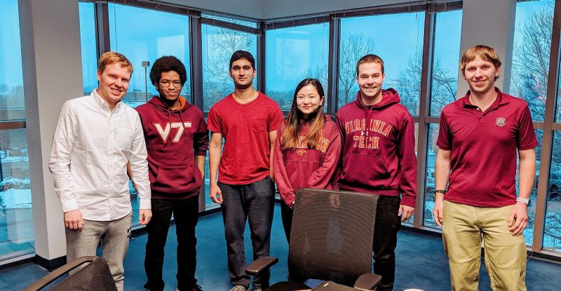 JW and the Blockchain Bois team, from left, Nicolas Hardy, Neal Mangaokar, Jiayi Lee, Zachary Geier, flanked by their Block.one mentors Serguei Vinnitskii and Zachary Butler   at the Block.one office in the Corporate Research Center.