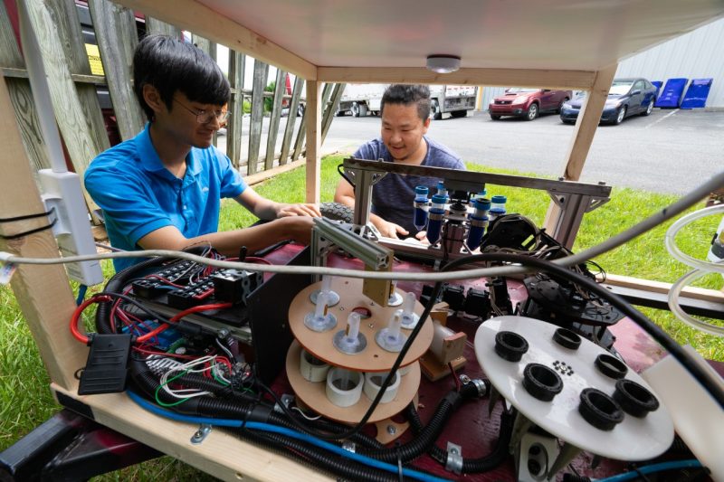 mechanical, and electrical and computer engineer students prepare the agBOT vehicle