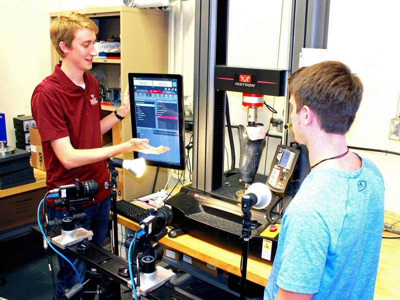  Carson Squibb and Trevor LeMaster track strains during simulated loading in the Aerospace Structures and Materials Laboratory.