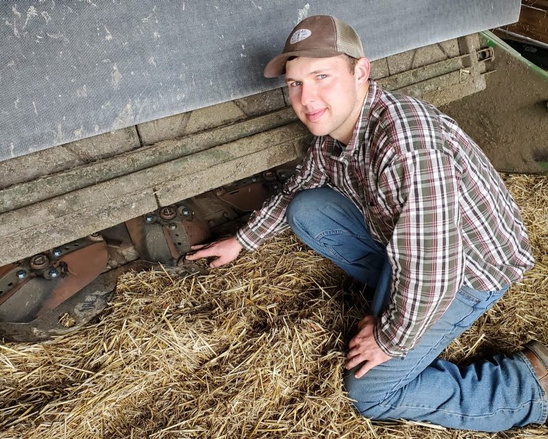Wade Reiter supplements his education by working on the family farm.