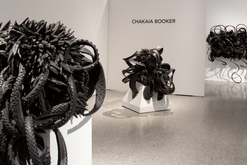 Three large-scale sculptures made from rubber tires by artists Chakaia Booker are on display in the Moss Arts Center gallery.