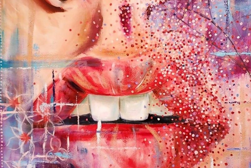 A woman's lips are transposed with colorful dots and flowers in this detailed view of Mikayla Spivey's painting, "Focus/Unfocus."