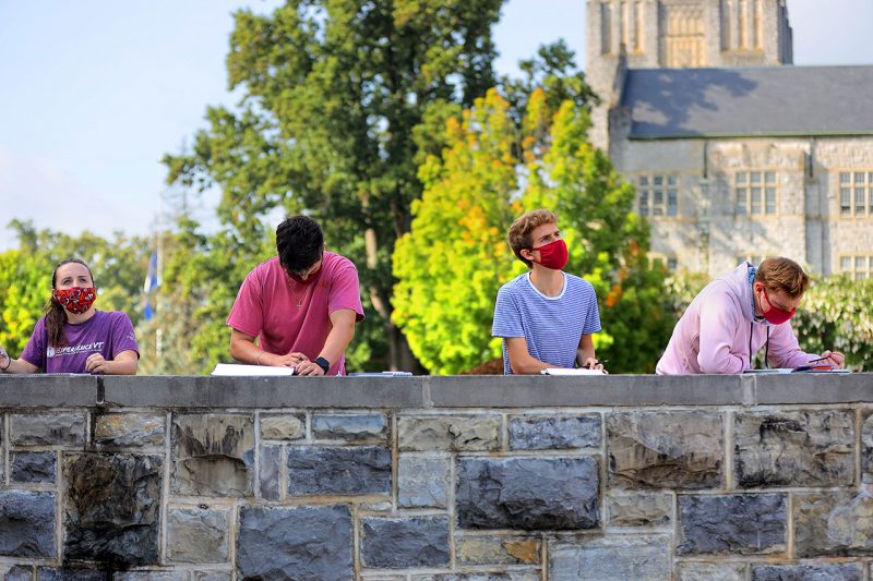 Students participate in an outdoor sketch class on Virginia Tech's Blacksburg campus. 