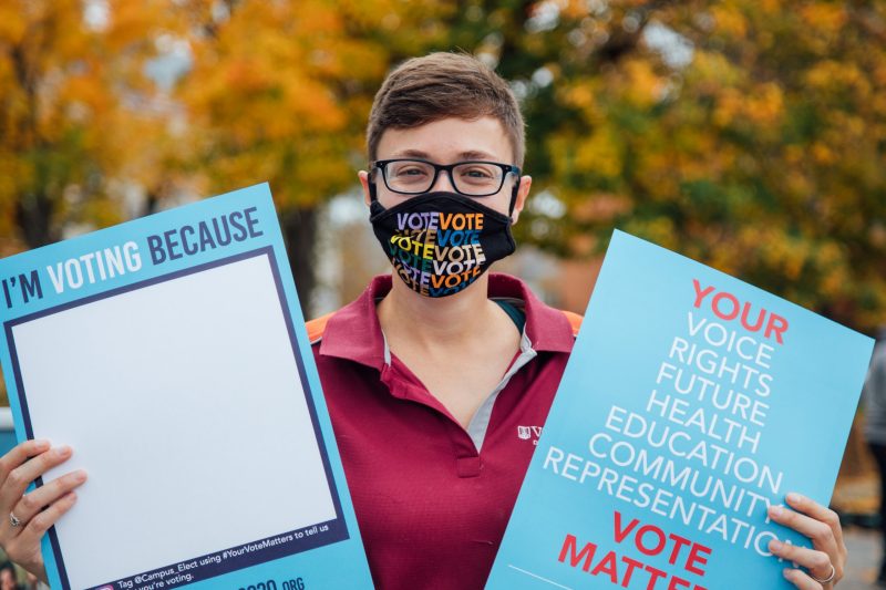 Students on campus promote the right to vote. Photo by Christina Franusich.