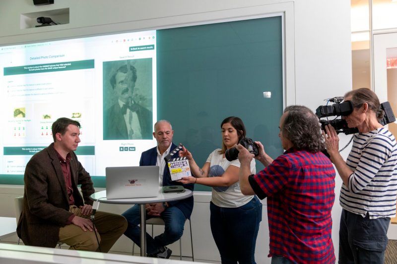 Computer science associate professor Kurt Luther demonstrates his Civil War Photo Sleuth software in an interview with the History Channel in October 2019 at the Virginia Tech Research Center in Arlington, Va.  Erin Williams for Virginia Tech.
