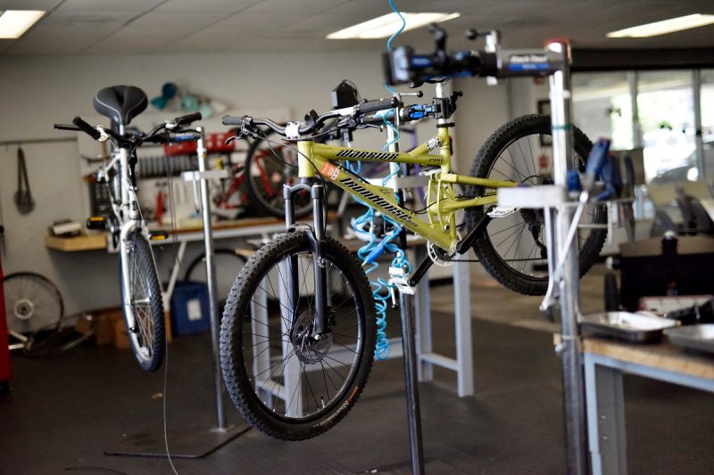Hokie Bike Hub: Bikes being worked on elevated off ground